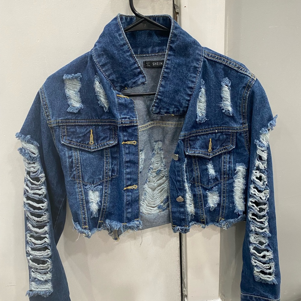 Distressed jean jacket